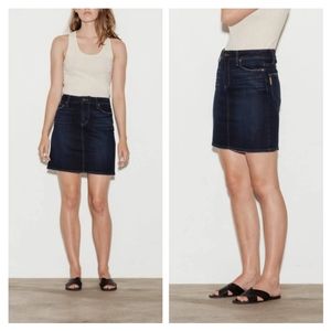 PAIGE Dark blue jean skirt, with zipper closure and button in front.